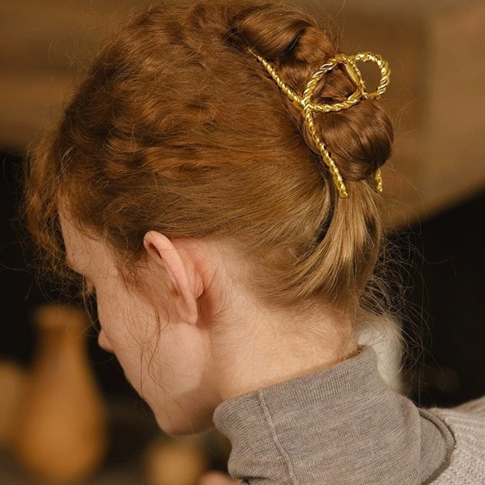 Minimalistische gedraaide lijn grote klauw haarclip