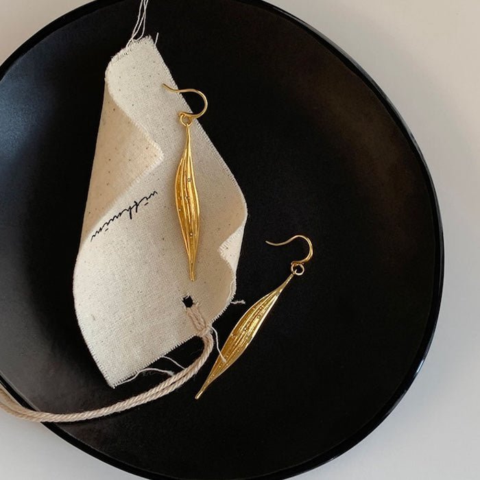 Subtiele oogverblindende gouden blad oorbellen