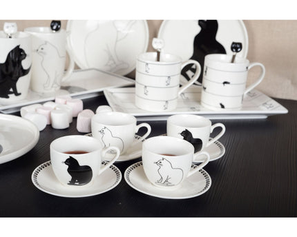 Koffiekopjes met zwart -witte kattenschotels - veel van 4