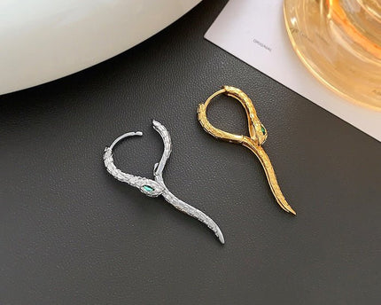 Unieke groene -eye cobra -ontwerp oorbellen - goud n zilver