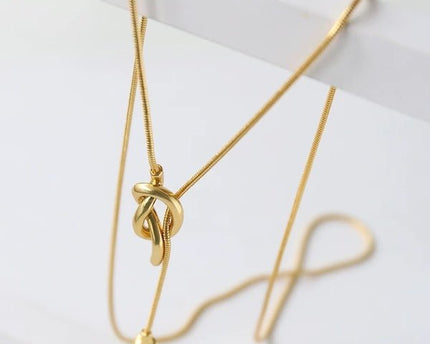 Minimalistische lange trui ketting met knoop