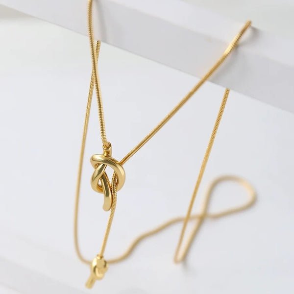 Minimalistische lange trui ketting met knoop