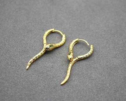 Unieke groene -eye cobra -ontwerp oorbellen - goud n zilver