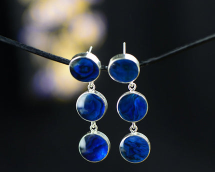 Unieke blauwe oorbel met abalone schelp