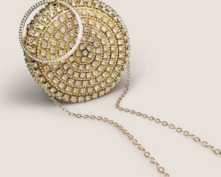 Oogverblindende ronde clutch met diamantlook