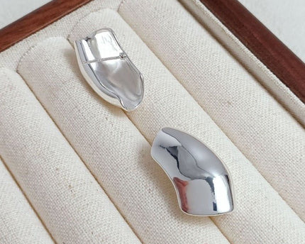 Unieke zilveren Armor Wrap oorbellen