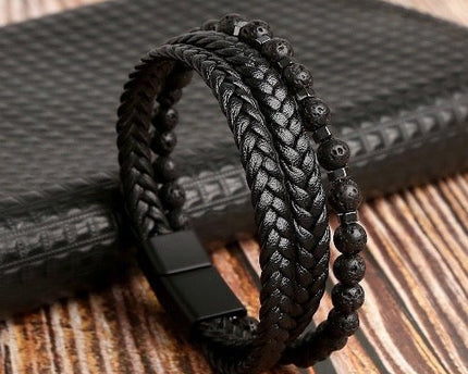 Gevlochten leren armband met echte stenen