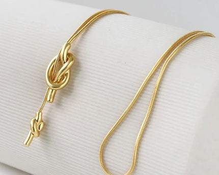Minimalistische lange trui ketting met knoop