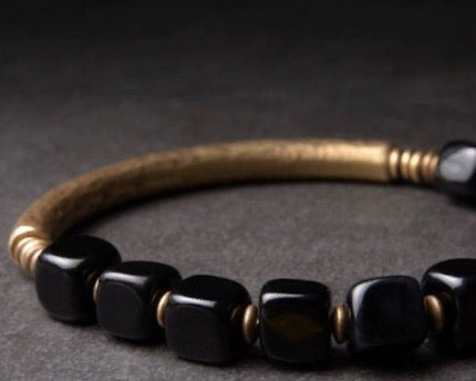 Zwarte obsidiaan blokken armband met bronzen armband