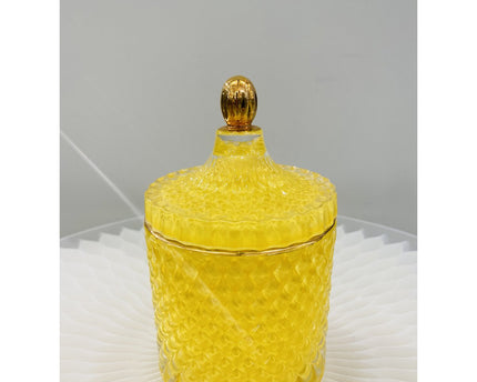 Een luxe glazen pot in een prachtige gele kleur