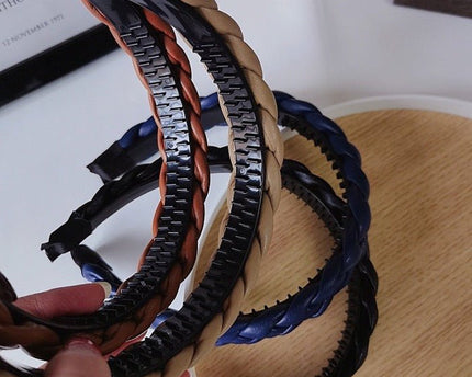 Vintage stijl gevlochten hoofdband in leerlook