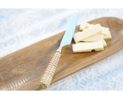 Beige kaasmes met rieten handvat