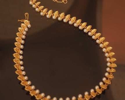 Vintage gouden bladeren parelketting