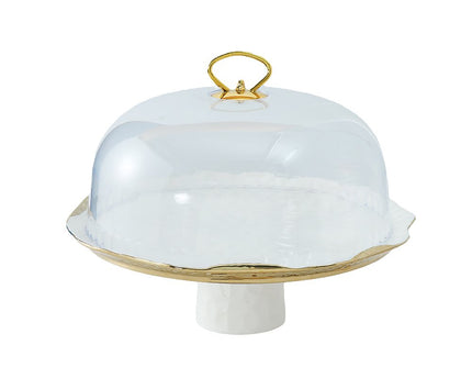 Witte porselein cake bel gouden randen met taartschop