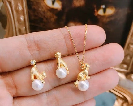 Leuke asymmetrische kattenoorbellen en ketting