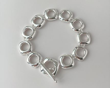 Stevige sterlingzilveren armband met gedurfde look en vierkante frameschakels met OT-gesp