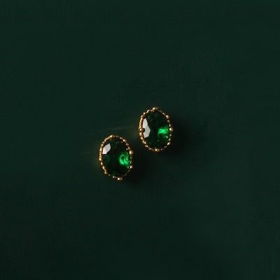 Moderne vintage groene kristallen oorstekers