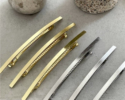 Minimalistische metalen haarclip met één regel