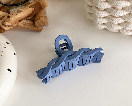 Minimalistische blauwe kleurtoon klauw haarclips