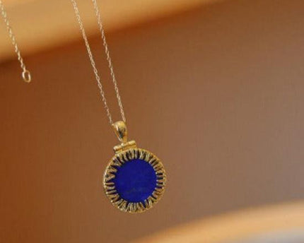 Helios lapis lazuli ronde hanger ketting