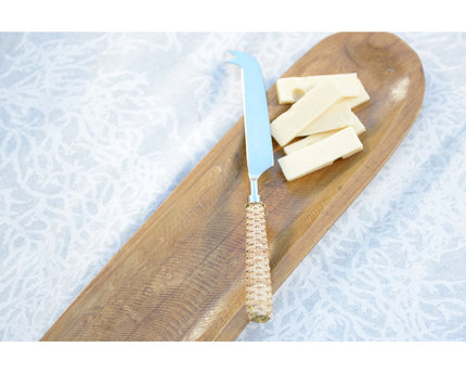 Beige kaasmes met rieten handvat