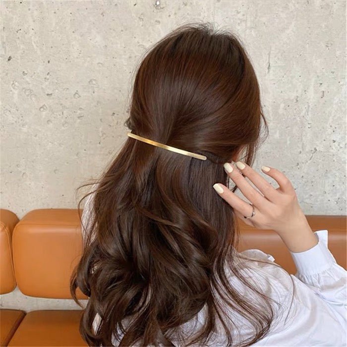 Minimalistische metalen haarclip met één regel
