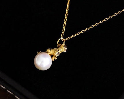 Leuke asymmetrische kattenoorbellen en ketting