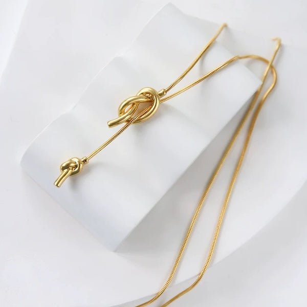 Minimalistische lange trui ketting met knoop