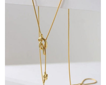 Minimalistische lange trui ketting met knoop