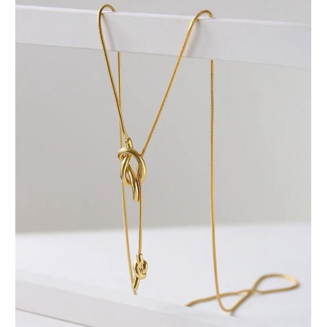 Minimalistische lange trui ketting met knoop