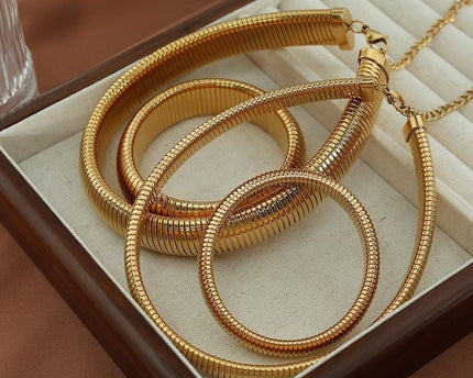 Dikke stretch designarmband en choker