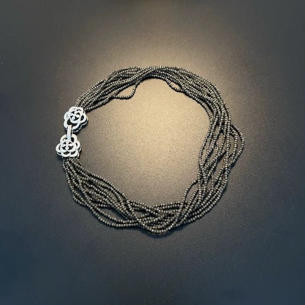 Gevlochten choker met cat's oogstenen kralen - Camille sluiting