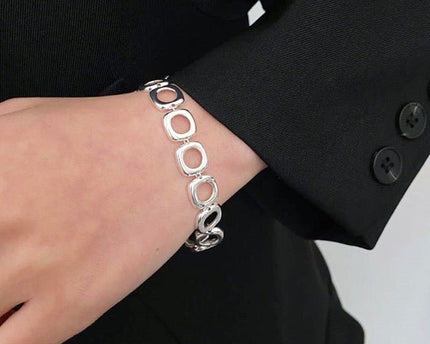 Stevige sterlingzilveren armband met gedurfde look en vierkante frameschakels met OT-gesp