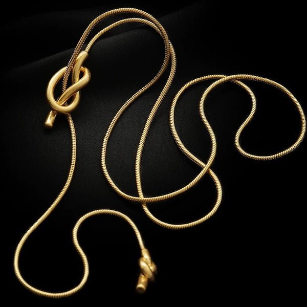 Minimalistische lange trui ketting met knoop