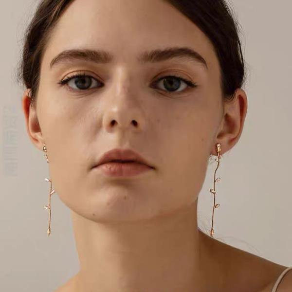 Retro rosévergulde lange oorbellen