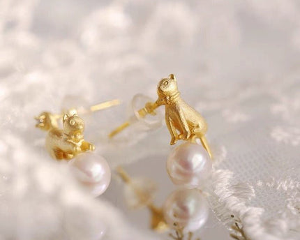 Leuke asymmetrische kattenoorbellen en ketting