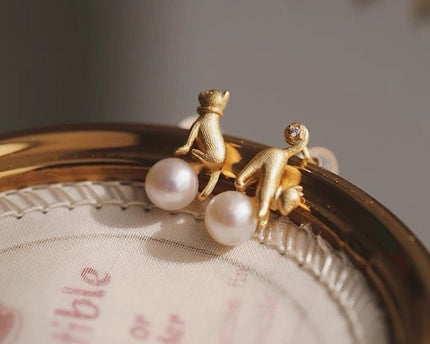 Leuke asymmetrische kattenoorbellen en ketting