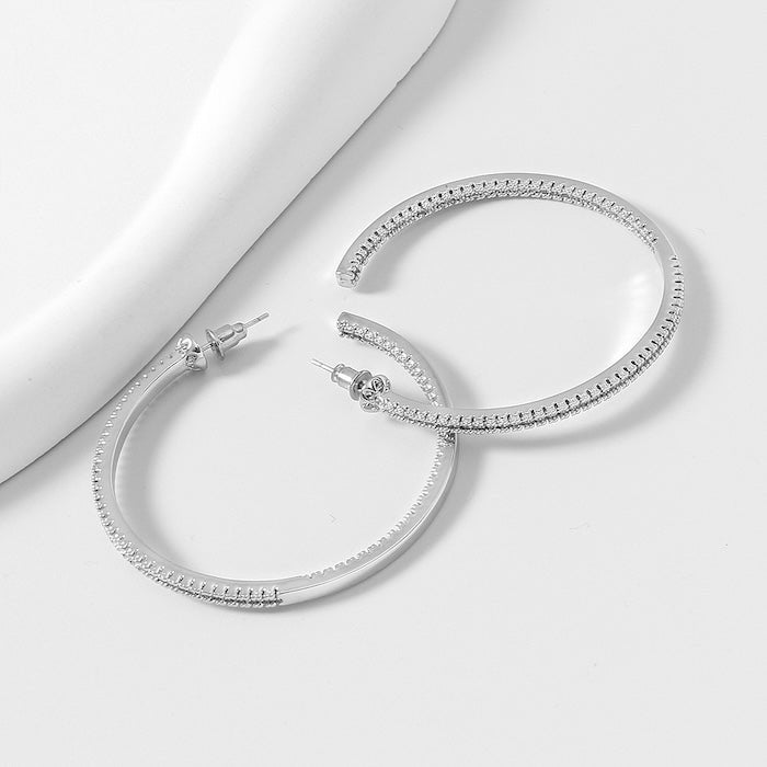 Oversized sprankelende hoepeloorbellen - 360 graden glamour