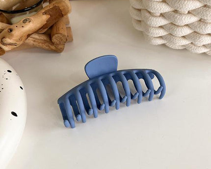 Minimalistische blauwe kleurtoon klauw haarclips