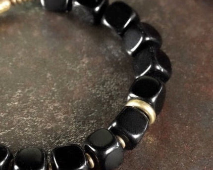 Zwarte obsidiaan blokken armband met bronzen armband