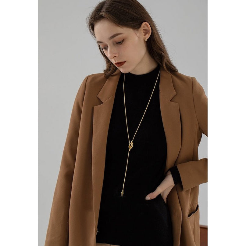 Minimalistische lange trui ketting met knoop