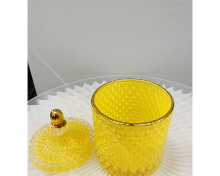 Een luxe glazen pot in een prachtige gele kleur