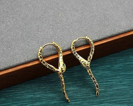 Unieke groene -eye cobra -ontwerp oorbellen - goud n zilver