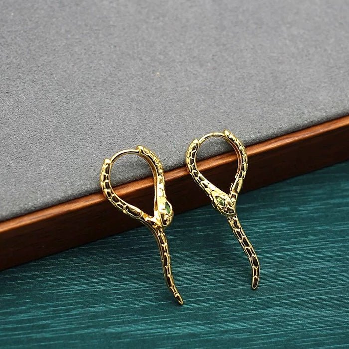 Unieke groene -eye cobra -ontwerp oorbellen - goud n zilver