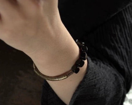 Zwarte obsidiaan blokken armband met bronzen armband