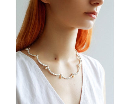 Elegante kanten bloemversiering parelketting