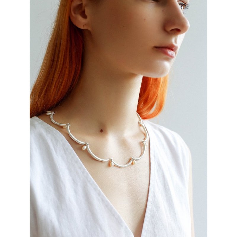 Elegante kanten bloemversiering parelketting