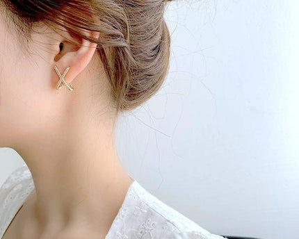 Minimalistische kruis sprankelende oorbellen