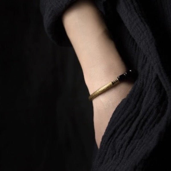 Zwarte obsidiaan blokken armband met bronzen armband