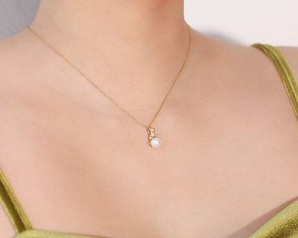 Leuke asymmetrische kattenoorbellen en ketting